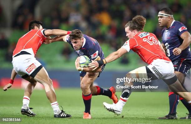 Tom English of the Rebels runs with the ball during the round 15 Super Rugby match between the Rebels and the Sunwolves at AAMI Park on May 25, 2018...