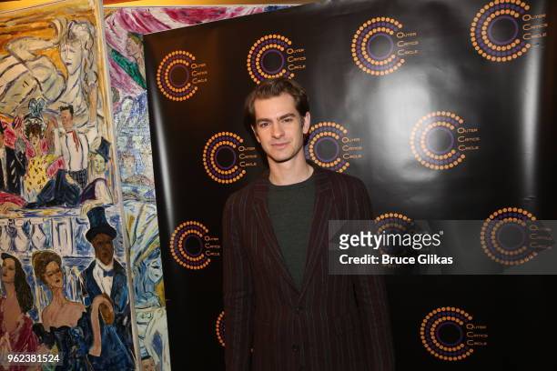 Best Actor in a Play "Angels in America" winner Andrew Garfield poses at the 2018 Outer Critics Circle Awards at Sardi's on May 24, 2018 in New York...