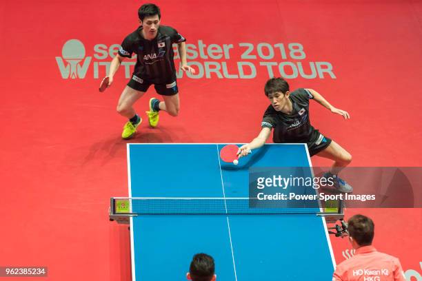 Jin Ueda and Maharu Yoshimura of Japan compete against Ho Kwan Kit and Wong Chun Ting of Hong Kong during men's doubles - semifinals of Table Tennis...