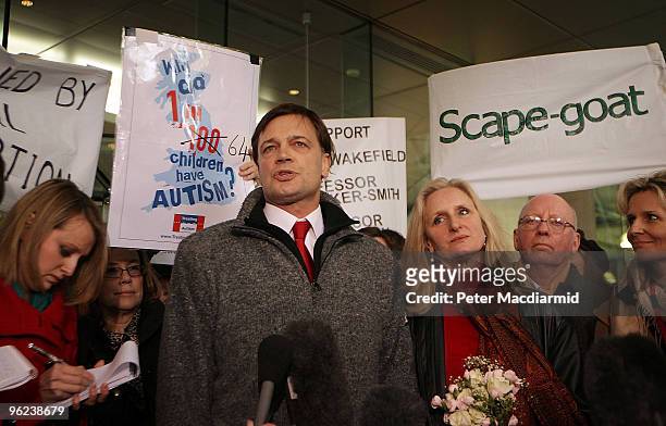 Dr Andrew Wakefield stands with his wife Carmel as he talks to reporters at the General Medical Council on January 28, 2010 in London, England. Dr...