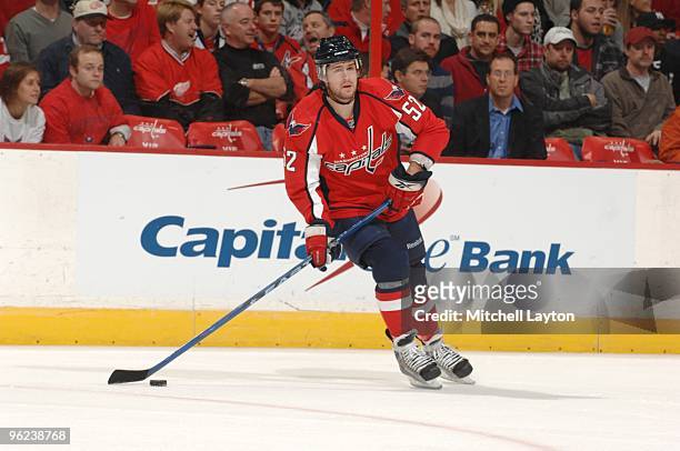 Mike Green of the Washington Capitals looks to make a pass during a NHL hockey game against the Detroit Red Wings on January 19, 2010 at the Verizon...