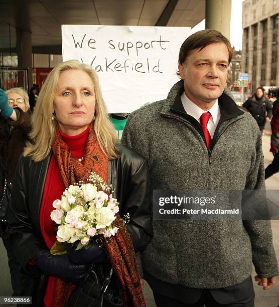 Dr Andrew Wakefield walks with his wife Carmel after speaking to reporters at the General Medical Council on January 28, 2010 in London, England. Dr...