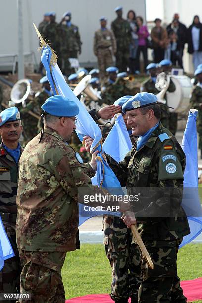 The new commander of the United Nations Interim Force in Lebanon Major-General Alberto Asarta Cuevas of Spain receives the flag from outgoing UNIFIL...