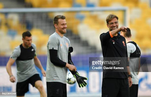 Simon Mignolet of Liverpool talks with Jurgen Klopp, Manager of Liverpool during a Liverpool training session ahead of the UEFA Champions League...