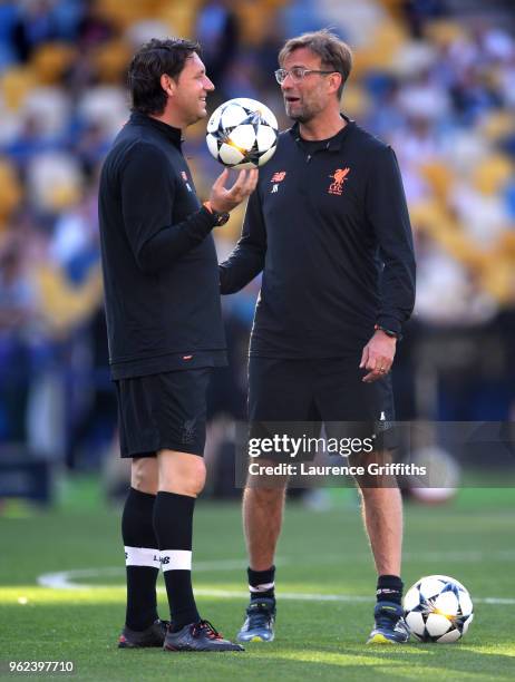 Jurgen Klopp, Manager of Liverpool and Peter Krawietz assistant coach of Liverpool look on during a Liverpool training session ahead of the UEFA...