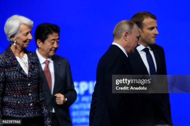 France's President Emmanuel Macron , Russia's President Vladimir Putin , Japan's Prime Minister Shinzo Abe and International Monetary Fund Managing...