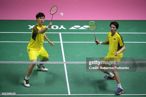 Li Junhui and Liu Yuchen of China compete against Mohammad Ahsan and Hendra Setiawan of Indonesia during the Semi-finals match on day six of the BWF...