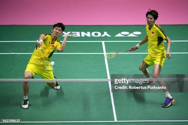 Li Junhui and Liu Yuchen of China compete against Mohammad Ahsan and Hendra Setiawan of Indonesia during the Semi-finals match on day six of the BWF...