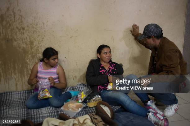 People who are part of the Migrant Caravan, rest and eat in a hostel in the city on their way through Mexicali to Tijuana and then apply for asylum...