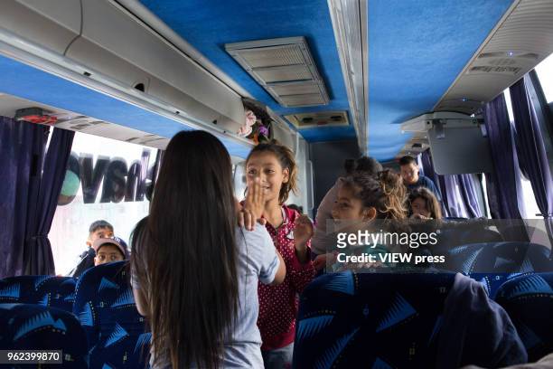 Children who are part of the migrant caravan play inside the bus that will take them to Tijuana and then apply for asylum in the US on April, 24 2018...