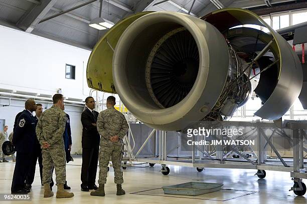 President Barack Obama greets members of the US Air Force as he tours a maintenance hangar for a KC-135 Stratotanker, that were recently used to...
