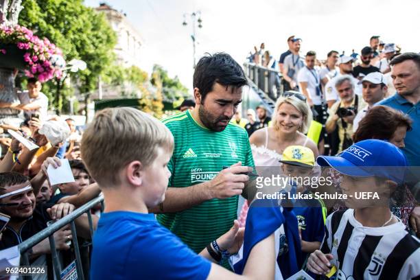 Deco of UEFA Champions League Legends gives autographs to fans during the Ultimate Champions Tournament at the Champions Festival ahead of the UEFA...