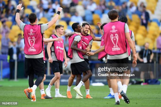 Danny Ings of Liverpool celebrates with teammates during a Liverpool training session ahead of the UEFA Champions League Final against Real Madrid at...