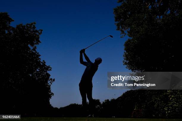 Justin Rose of England plays his shot from the 12th tee during round two of the Fort Worth Invitational at Colonial Country Club on May 25, 2018 in...