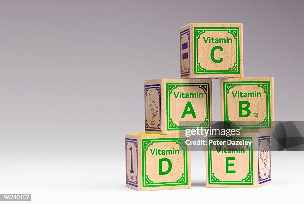 kids vitamin building blocks.  - 5 am tag stock-fotos und bilder