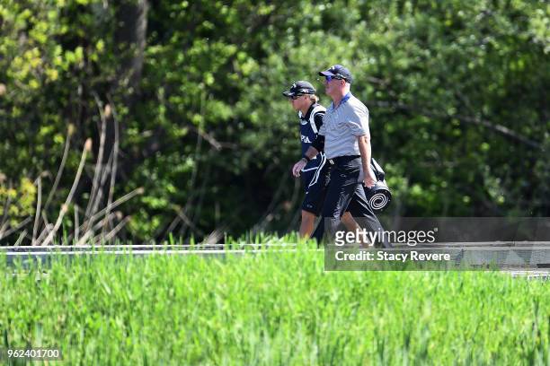 Peter Lonard of Australia walks to the 18th fairway during the second round of the Senior PGA Championship presented by KitchenAid at the Golf Club...