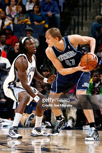 Andrei Kirilenko of the Utah Jazz looks for an open pass over DeMarre Carroll of the Memphis Grizzlies during the game on January 8, 2010 at...