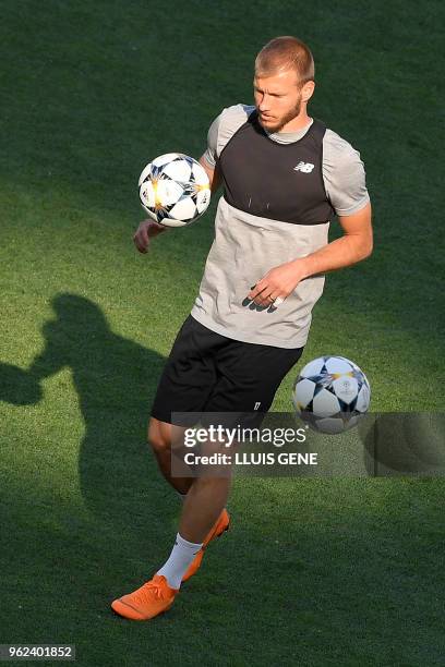 Liverpool's Estonian defender Ragnar Klavan controls the ball during a Liverpool team training session at the Olympic Stadium in Kiev, Ukraine on May...