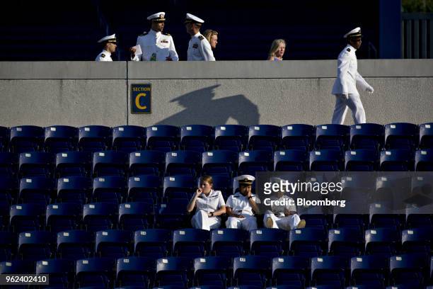Midshipmen wait before the start of the United States Naval Academy graduation and commissioning ceremony at the Navy-Marine Corps Memorial Stadium...