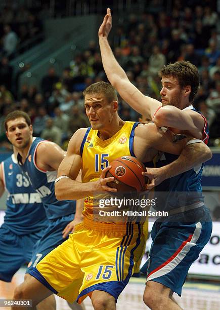 Robertas Javtokas, #15 of BC Khimki competes with Luksa Andric, #12 of Cibona during the Euroleague Basketball 2009-2010 Last 16 Game 1 between BC...