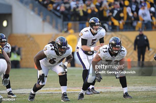Offensive linemen Oniel Cousins and Marshal Yanda of the Baltimore Ravens are set to block for quarterback Joe Flacco during a game against the...