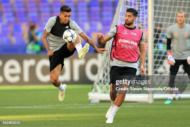 Roberto Firmino of Liverpool battles with Emre Can of Liverpool during a training session ahead of the UEFA Champions League Final between Real...