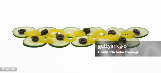 a section or layer of toppings for a sandwich - toppings stock pictures, royalty-free photos & images