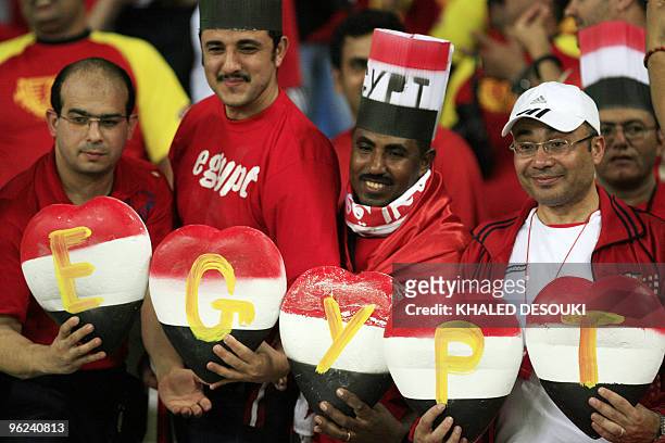 Egyptian fan cheer for their national team in the Ombaka stadium in Benguela on January 28 before of semi final match between Egypt and Algeria in...