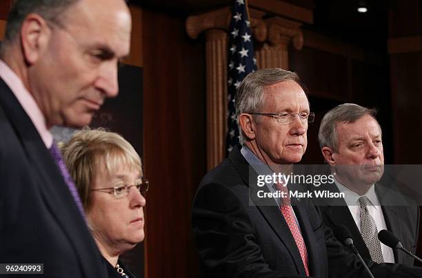 Senate Majority Leader Harry Reid speaks during a news conference as Sen. Richard Durbin , Sen. Patty Murray and Sen. Charles Schumer listen on...