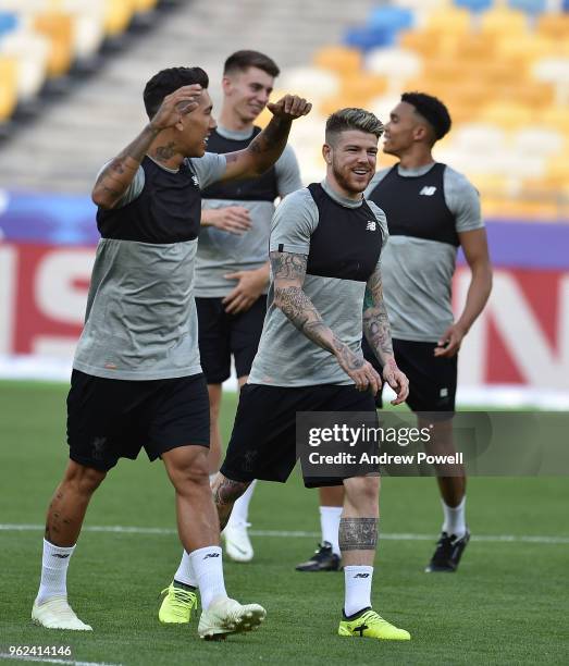 Roberto Firmino and Alberto Moreno of Liverpool during training session before the UEFA Champions League final between Real Madrid and Liverpool on...