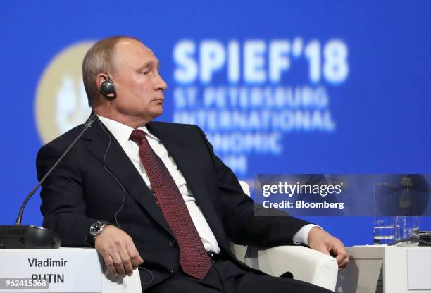 Vladimir Putin, Russia's president, looks on during the plenary session at the St. Petersburg International Economic Forum in St. Petersburg, Russia,...
