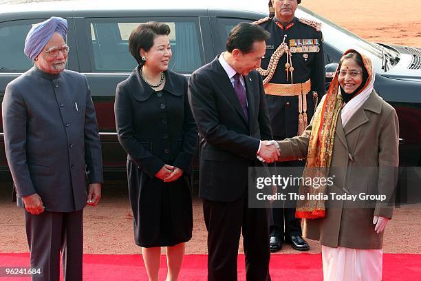 President of the Republic of South Korea Lee Myung-bak and his wife Kim Yoon-ok being received by President Pratibha Patil and Prime Minister...