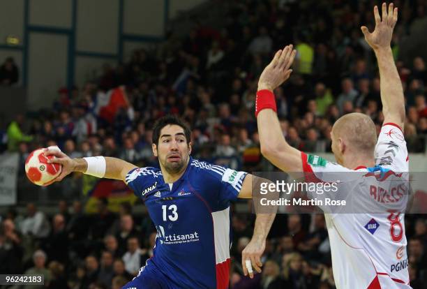Karol Bielecki of Poland in action with Nikola Karabatic of France during the Men's Handball European main round Group II match between Poland and...