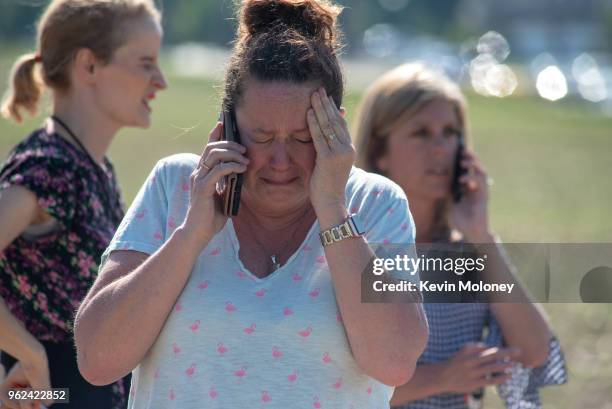 Instructional Assistant Paige Rose reacts outside Noblesville West Middle School after a shooting at the school on May 25, 2018 in Noblesville,...