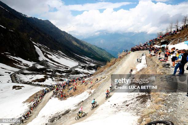 The peloton in action on Colle delle Finestre in the 19th stage from Venaria Reale to Bardonecchia during the 101st Giro d'Italia, Tour of Italy, on...