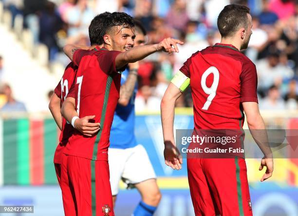 Portugal and SL Benfica forward Diogo Goncalves celebrates with teammates after scoring a goal during the U21 International Friendly match between...