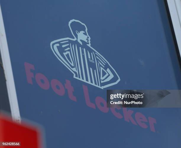 The logo of Foot locker is seen in the Munich pedestrian zone.