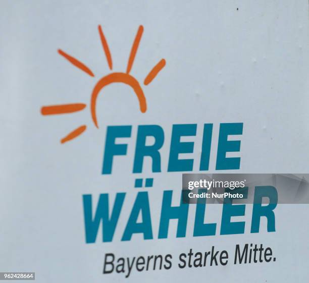 The logo of the Freie Waehler party is seen in the Munich pedestrian zone.