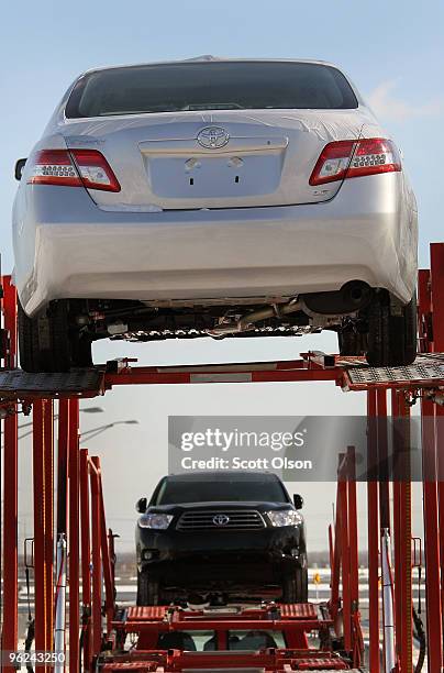 Toyota vehicles from the Toyota manufacturing facility in Princeton, Indiana sit on a truck outside Continental Toyota/Scion January 28, 2010 in...