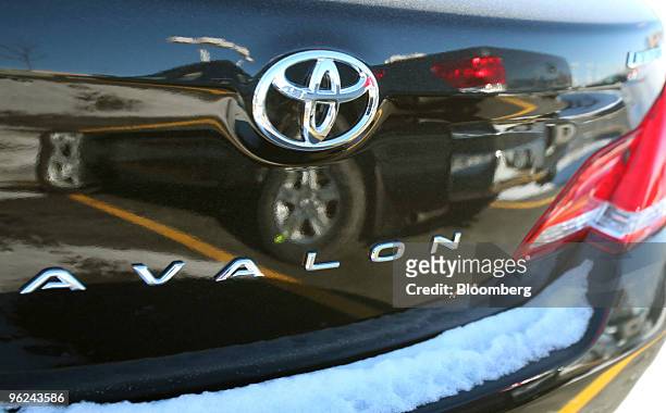 New Toyota Tundra pickup is seen reflected in a new Toyota Avalon sedan at Bredemann Toyota in Park Ridge, Illinois, U.S., on Thursday, Jan. 28,...