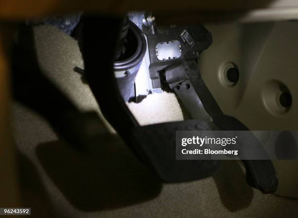 The gas pedal of a new Toyota Highlander is seen in the showroom at Bredemann Toyota in Park Ridge, Illinois, U.S., on Thursday, Jan. 28, 2010. The...