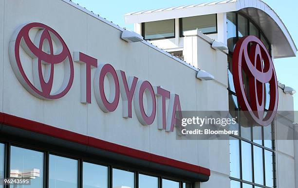 Toyota signage stands atop the showroom at Bredemann Toyota in Park Ridge, Illinois, U.S., on Thursday, Jan. 28, 2010. Toyota Motor Corp., the...