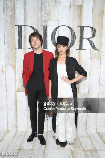 Charlie Heaton and Natalia Dyer pose at a photocall during Christian Dior Couture S/S19 Cruise Collection on May 25, 2018 in Chantilly, France.