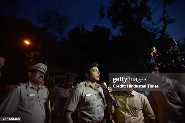 Harendra K. Singh and his team speak to the media outside Deputy Chief Minister of Delhi, Manish Sisodia's residence after investigating the...