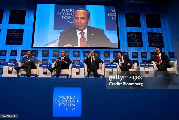 Fareed Zakaria, editor of Newsweek International, moderates a discussion with panelists, from left, Felipe Calderon, president of Mexico, Stephen...