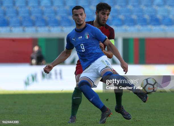 Italy and Spal forward Federico Bonazzoli with Portugal and CD Tondela defender Jorge Fernandes in action during the U21 International Friendly match...