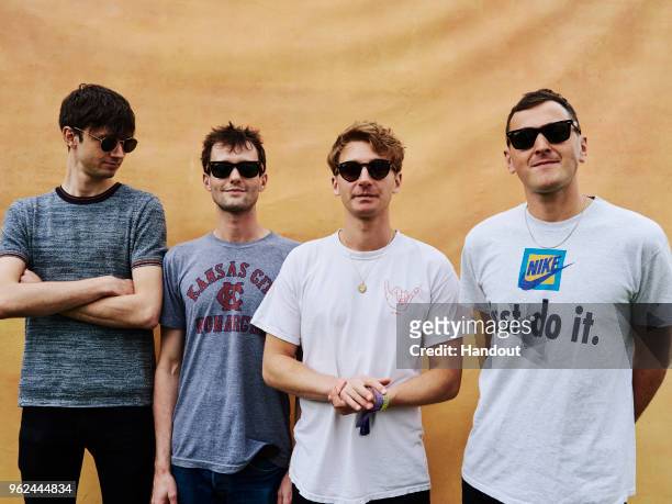In this handout image supplied by Ray-Ban, Glass Animals wearing Ray-Ban pose at the Ray-Ban Studios during All Points East Festival at Victoria Park...