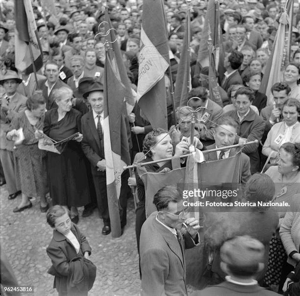 Workers in the square with the banner and the flags, are convened for the ceremony for the 60th anniversary of the foundation of the Chamber of Labor...