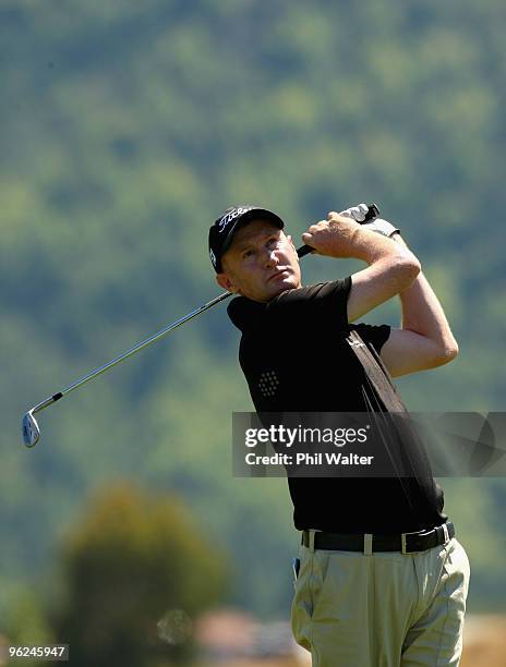 Richard Lee of New Zealand plays a shot on the 14th hole during day two of the New Zealand Open at The Hills Golf Club on January 29, 2010 in...