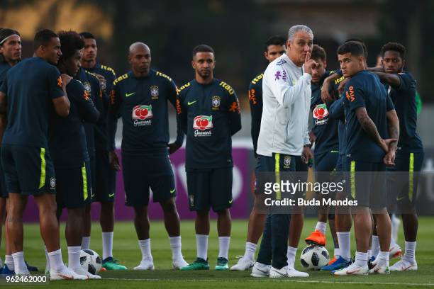 Head coach Tite asks the fans to be quiet during a training session of the Brazilian national football team at the squad's Granja Comary training...
